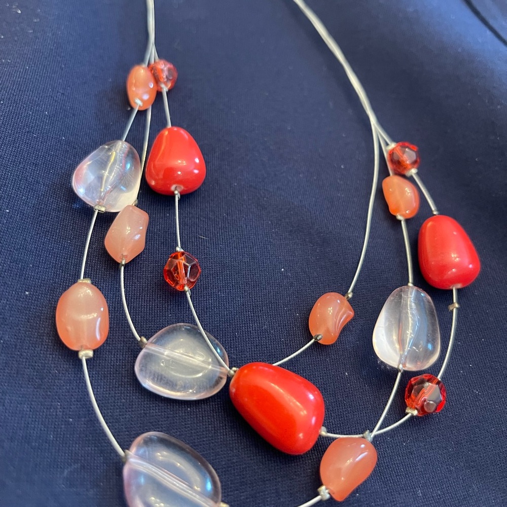 Faux pink and red necklace with silver chain